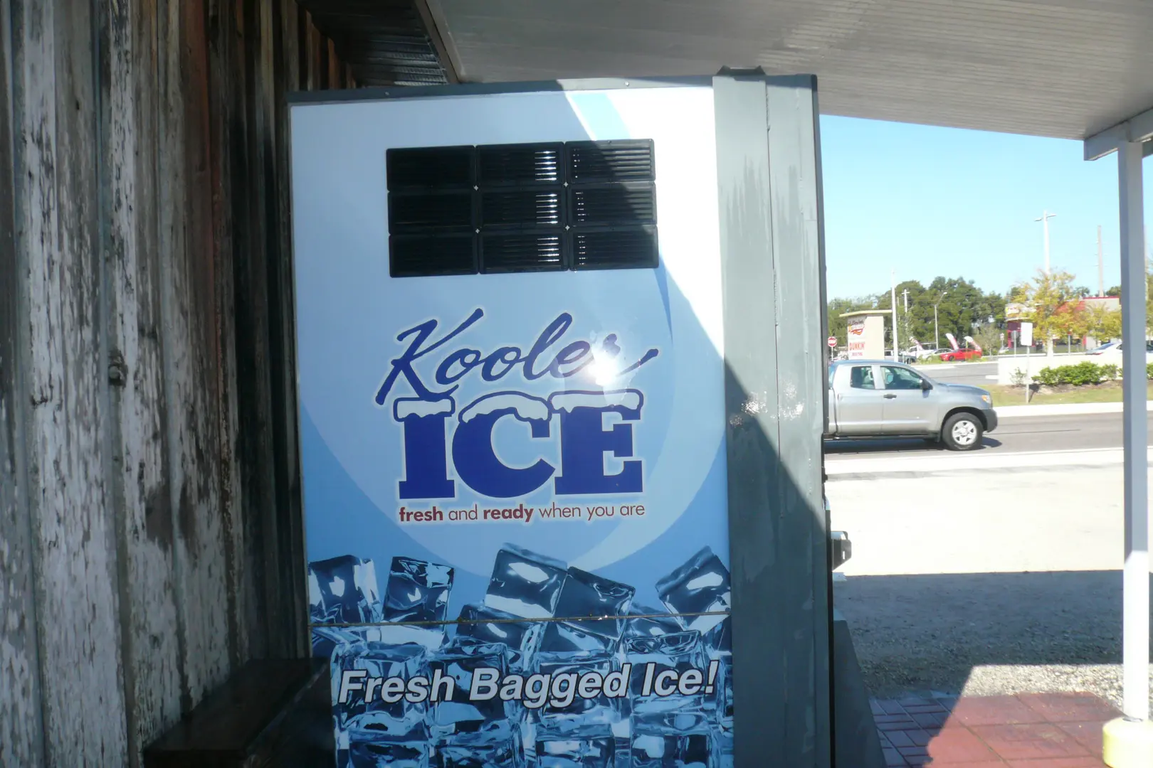 Kooler Ice machine near building