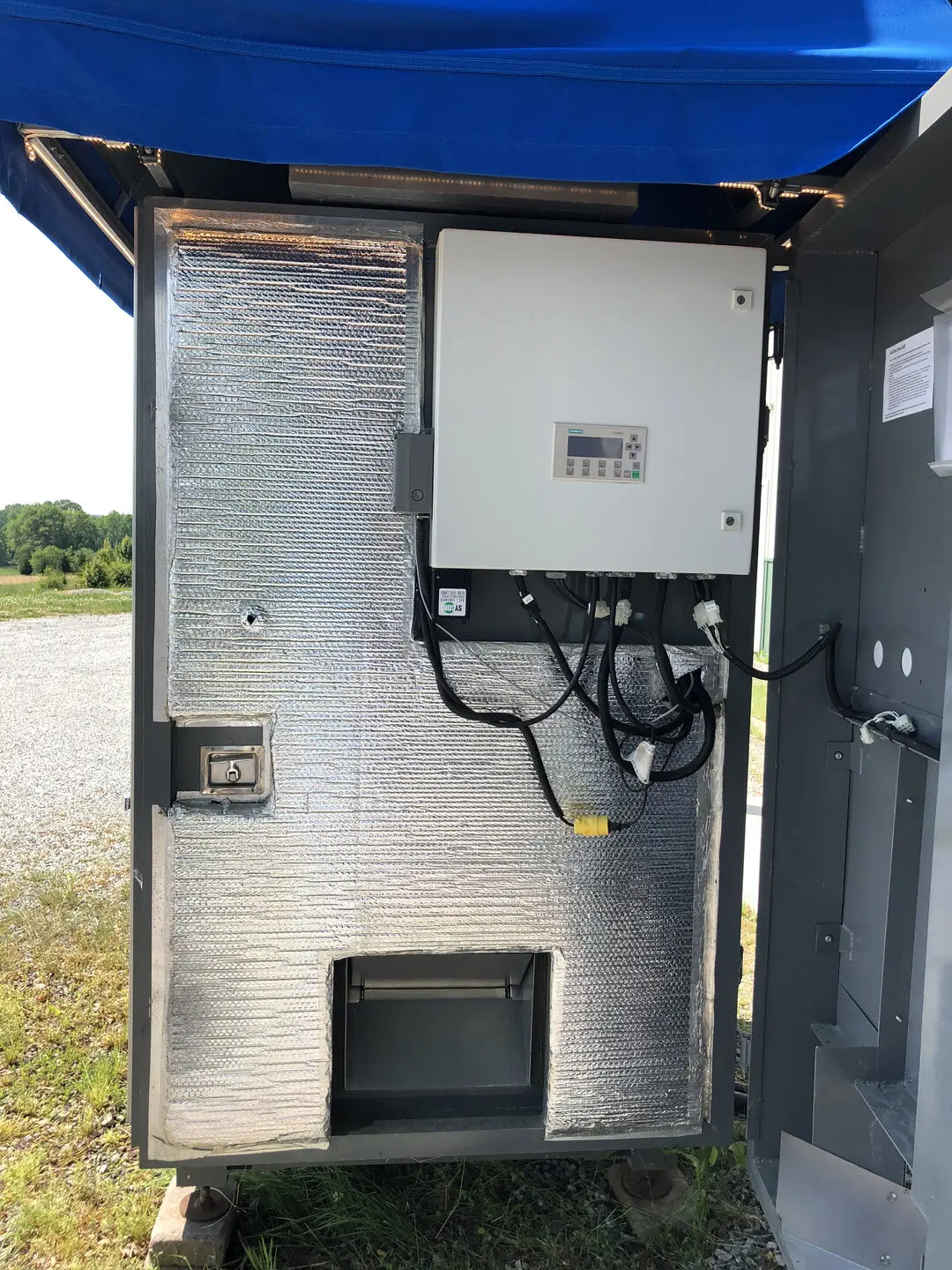 Outdoor electrical unit with cables