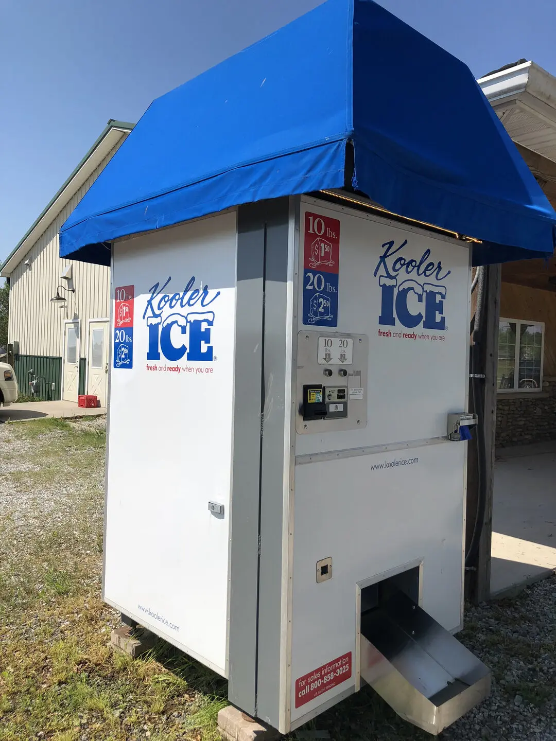 Kooler Ice machine near building