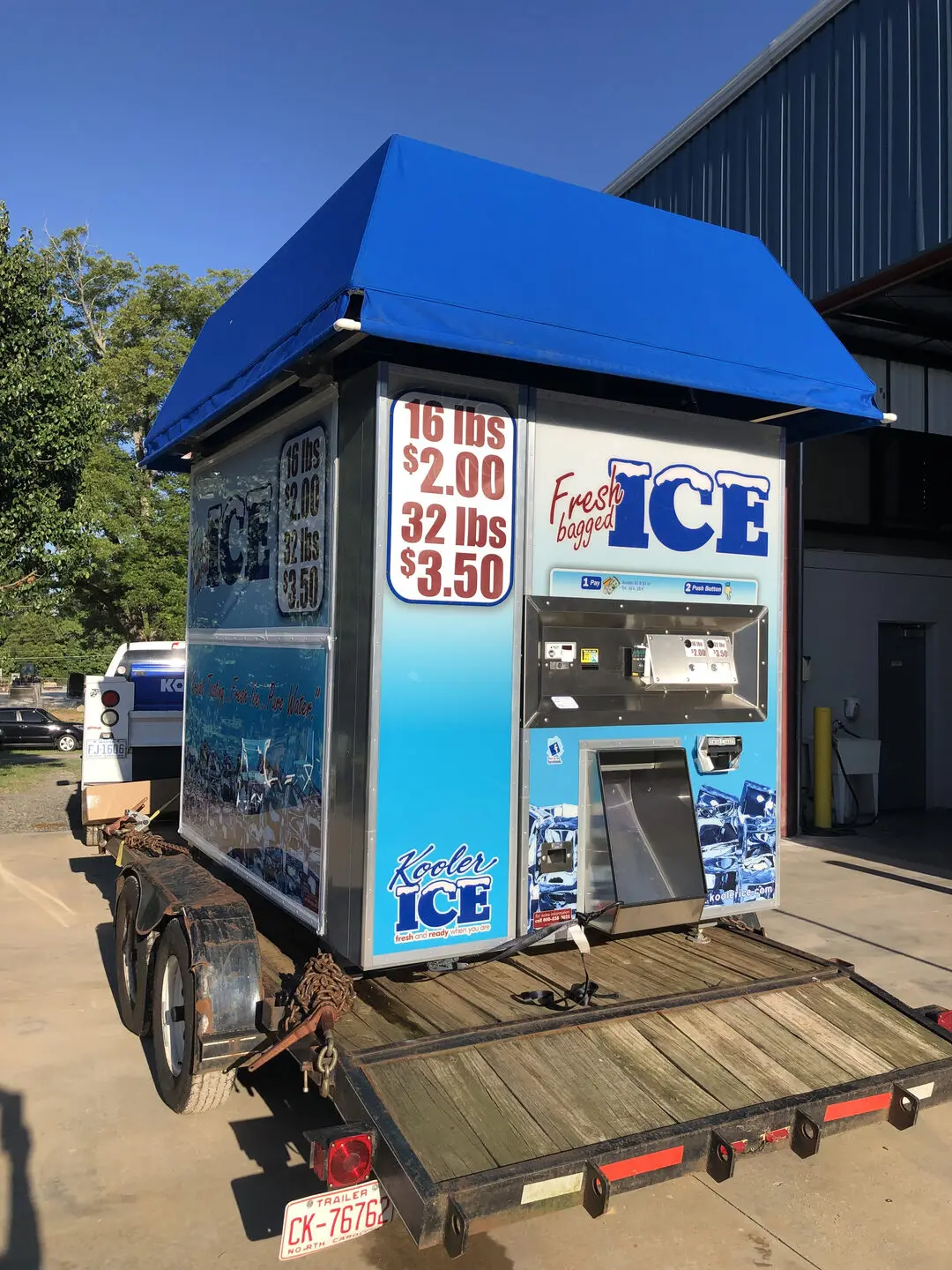 Portable ice dispenser with prices