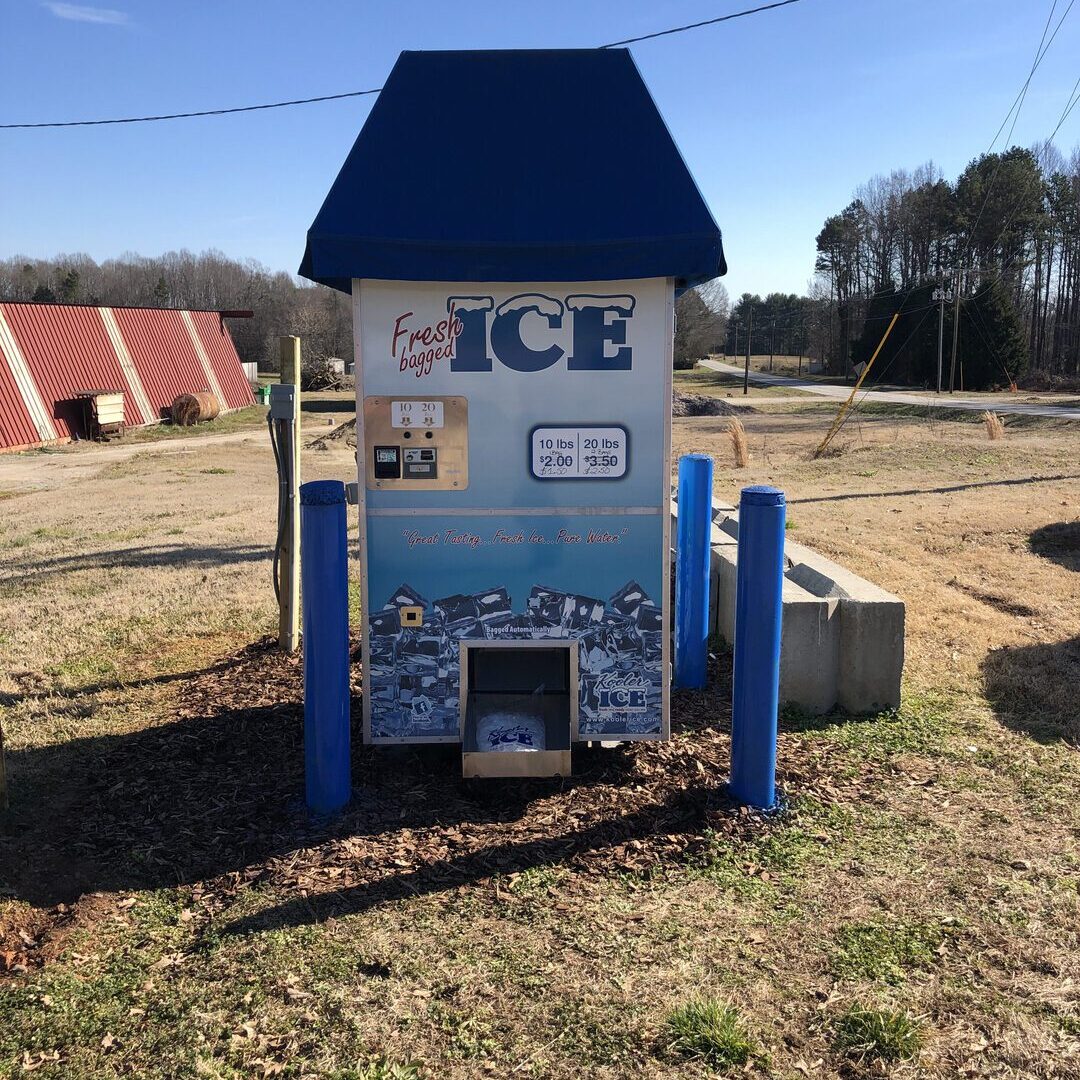 Outdoor ice dispenser under blue sky