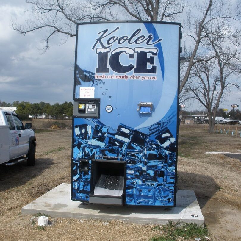 Blue vending machine with ice imagery.